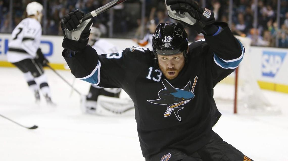 Controversial enforcer Raffi Torres, here with the Sharks, has signed a professional tryout agreement with the Hurricanes.
