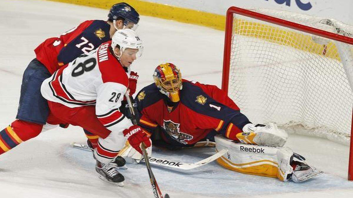 
Goaltender Roberto Luongo (1) of the Florida Panthers defends the net against the shot by Alexander Semin (28) of the Carolina Hurricanes during third period action at the BB&T Center on April 2, 2015 in Sunrise, Florida. The Panthers defeated the Hurricanes 6-1. 
