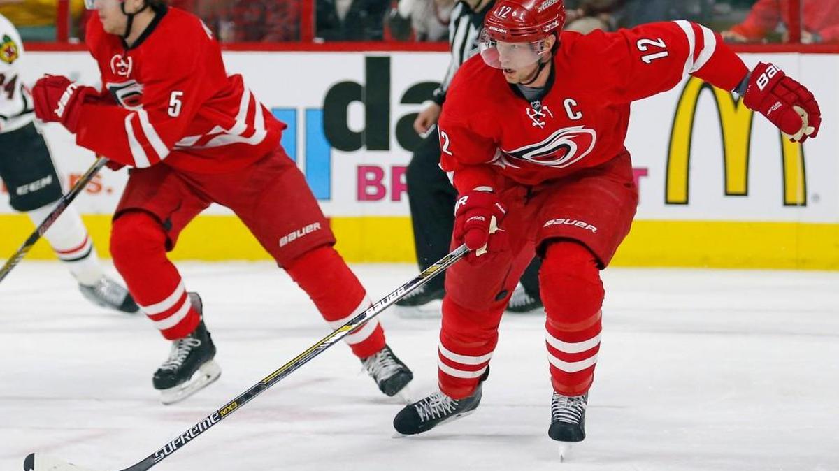 The Carolina Hurricanes' Eric Staal (12) moves the puck during an NHL game played between the Carolina Hurricanes and the Chicago Blackhawks at PNC on Jan. 26. The Canes beat the Blackhawks 5-0.