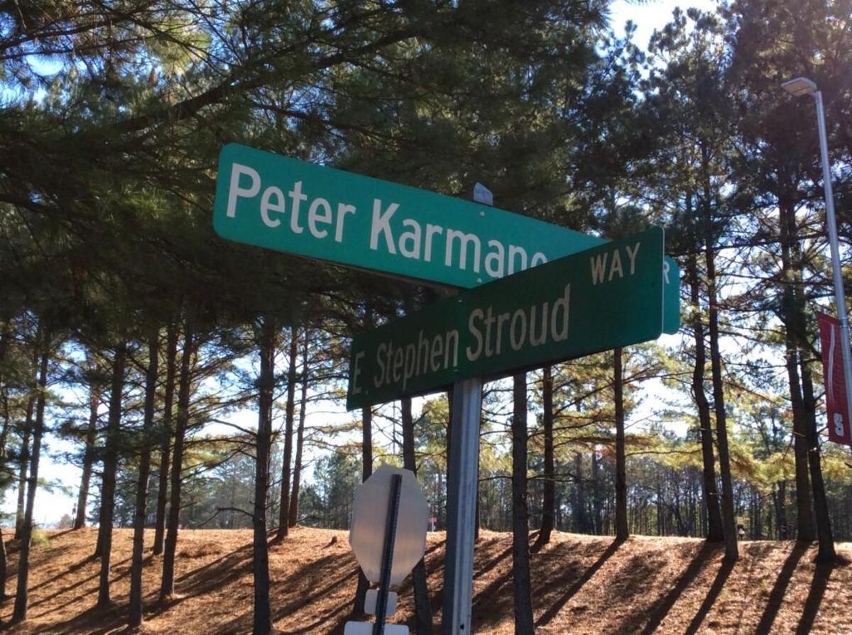 Street signs bearing the names of Peter Karmanos and Steve Stroud outside PNC Arena.