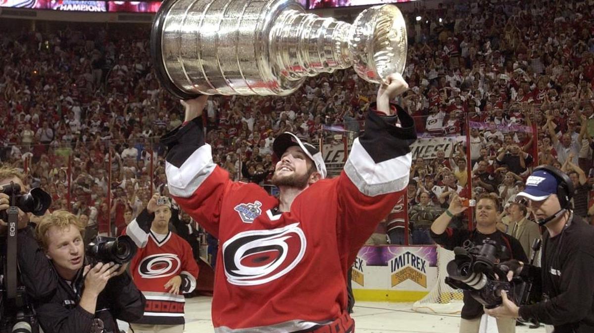 
The Carolina Hurricanes Cam Ward hoists the Stanley Cup at the RBC Center in Raleigh June 19, 2006. The Hurricanes beat the Edmonton Oilers 3-1 in Game 7 of the Stanley Cup.
