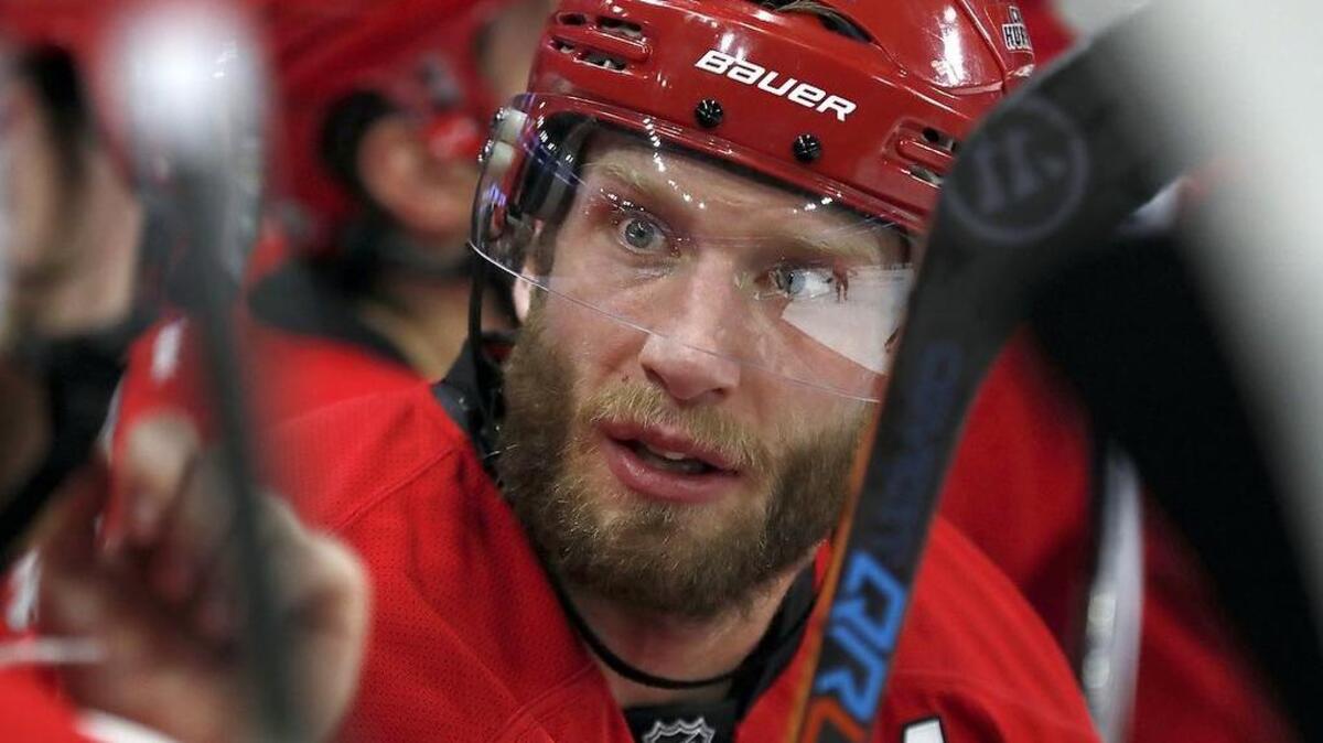 The Carolina Hurricanes' Jordan Staal (11) talks to teammates on the bench during the first period.