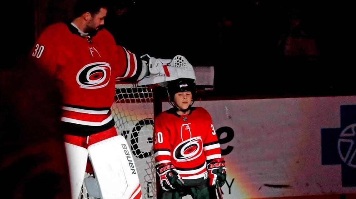 Canes’ Wards, father and son, share a special moment on the ice