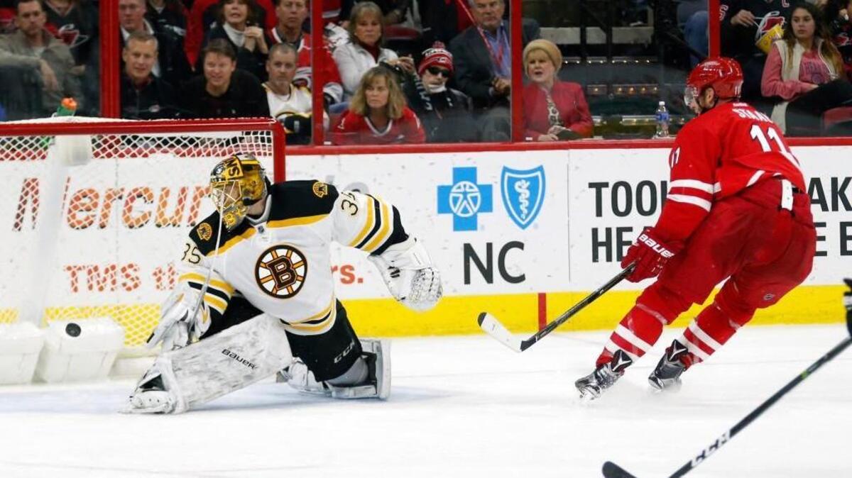 The Canes’ Jordan Staal (11) puts the puck past the Boston Bruins' Anton Khudobin (35) for a shorthanded goal at PNC Arena on Dec. 23, 2016.