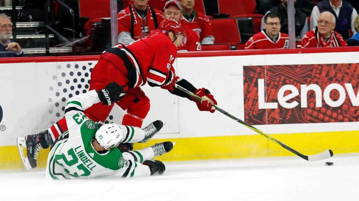 The Canes' Jordan Staal (11) gets around the Stars' Esa Lindell (23) before he passes to Sebastian Aho (20) for a goal during the first period. Staal had four assists in the game.