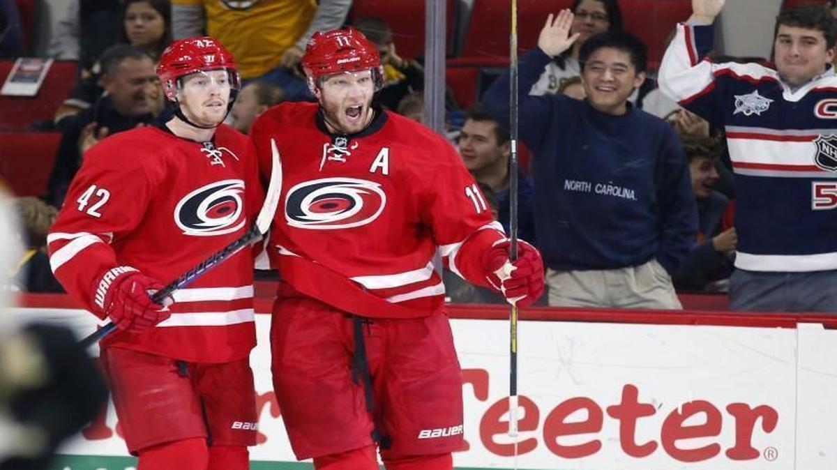 The Canes Jordan Staal, right, celebrates his short-handed goal with Joakim Nordstrom (42) during the second period at PNC Arena in Raleigh.