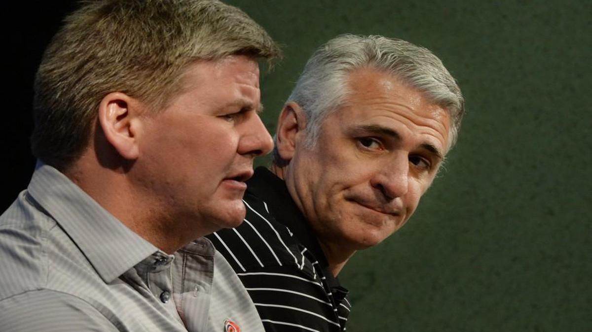 Carolina Hurricanes General Manager Ron Francis (right) looks at head coach Bill Peters as they hold their end of the season press conference at the PNC Arena on Tuesday, April 12, 2016.