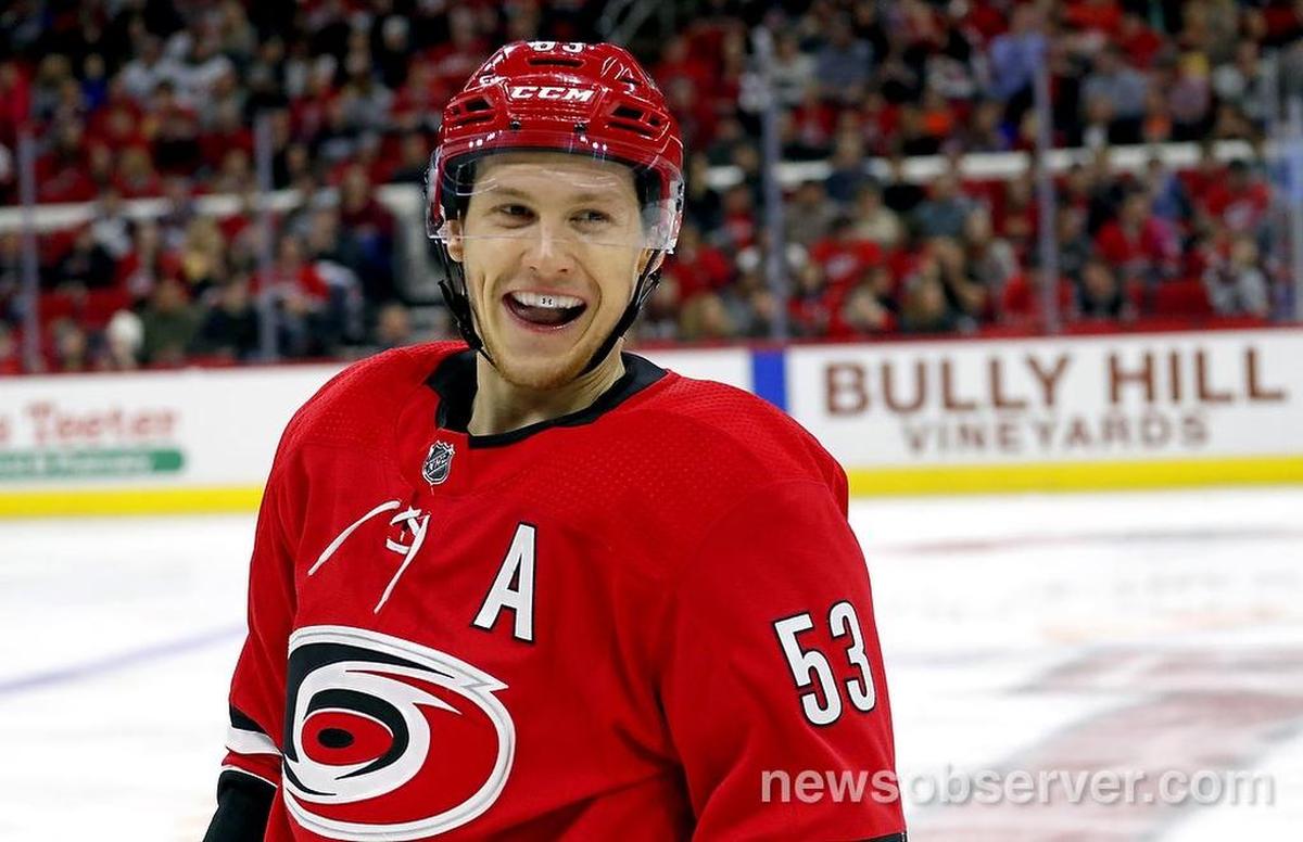The Canes' Jeff Skinner (53) flashes a smile during a break in the action during the first period. Skinner scored as the Canes beat Colorado 3-1.