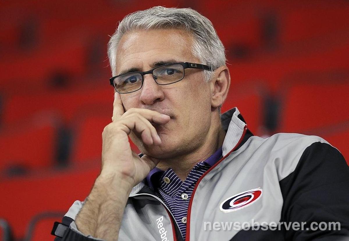 Ron Francis watches the team during a skating drill in the Carolina Hurricanes development camp held at the PNC Arena in Raleigh, N.C. on July 23, 2014.