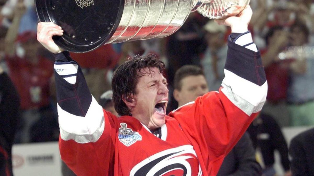 The Canes Rod Brind'Amour hoists the Stanley Cup after the Carolina Hurricanes beat the Edmonton Oilers in Game 7 of the Stanley Cup finals at the RBC Center on 6/19/06. The Canes won 3-1 to win the Stanley Cup.
