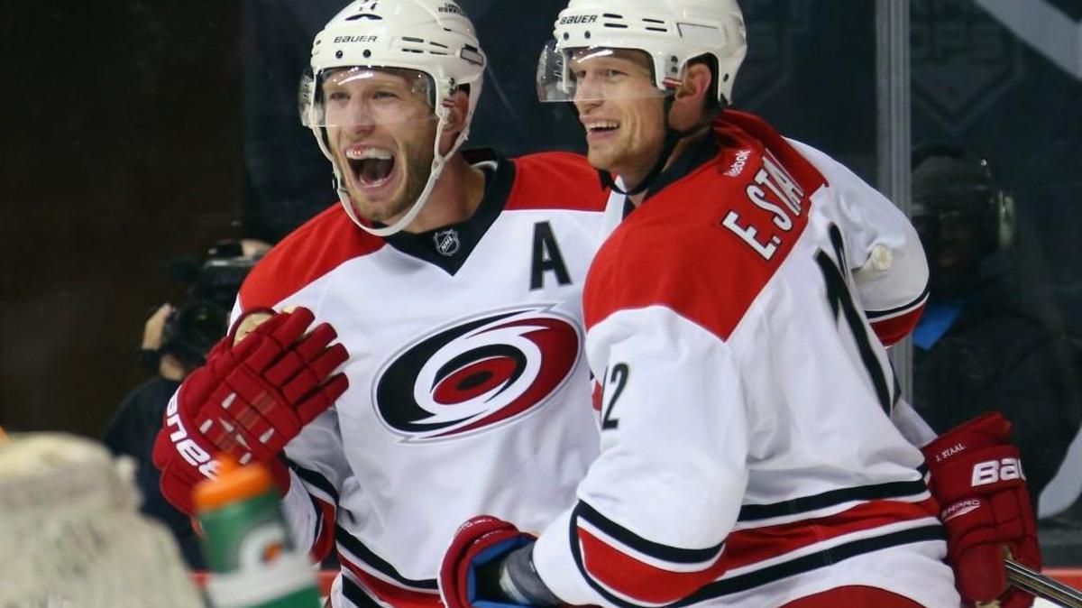 Brothers Jordan Staal, left, and Eric Staal, right, celebrate the goal against the Islanders in 2015.