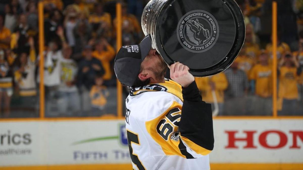 Pittsburgh Penguins’ Ron Hainsey kisses the Stanley Cup after Game 6 of the 2017 NHL Stanley Cup Final.