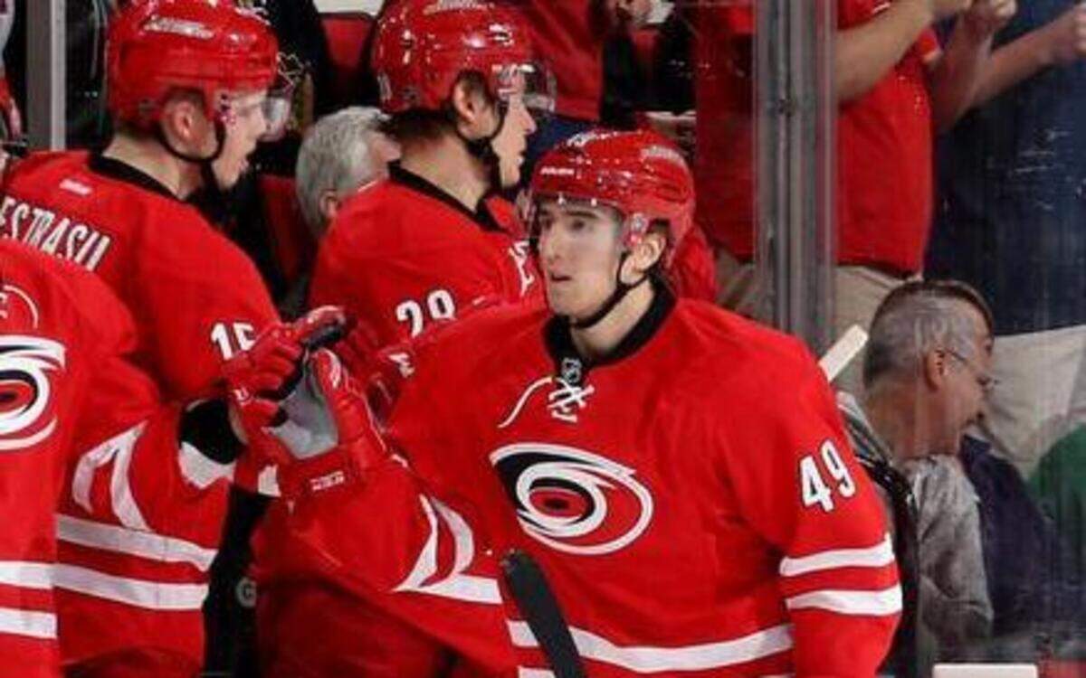 
Victor Rask #49 of the Carolina Hurricanes is congratulated by teammates after his second period goal during an NHL game against the Chicago Blackhawks at PNC Arena on March 23, 2015 in Raleigh, North Carolina.
