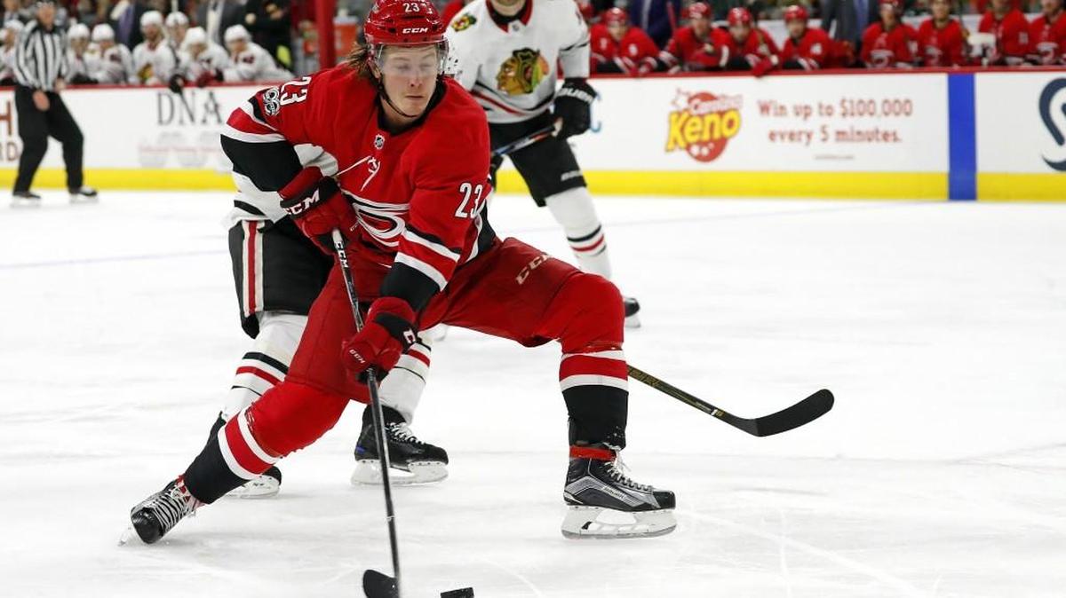 Carolina Hurricanes' Brock McGinn (23) shoots the puck against the Chicago Blackhawks during the second period of an NHL hockey game, Saturday, Nov. 11, 2017, in Raleigh, N.C. (AP Photo/Karl B DeBlaker)