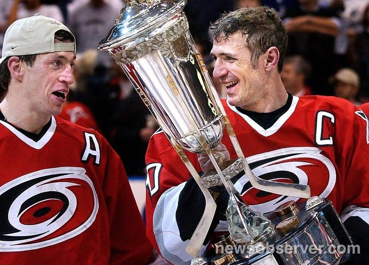 Carolina Hurricanes (10) Ron Francis, and teammate (17) Rod Brind'Amour accept the Prince of Wales trophy after they defeated Toronto 2-1 in overtime to win the Eastern Conference Championship on May 28, 2002 at the Air Canada Center.