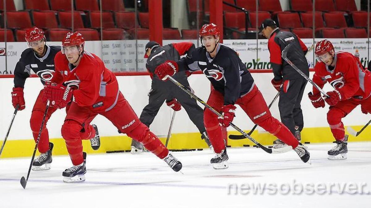 
From left; Jake Chelios, Chris Terry, Noah Hanifin, Derek Ryan and Ryan Murphy skate a drill during the Carolina Hurricanes first day of training camp at PNC Arena in Raleigh, N.C. on Sept. 18, 2015.
