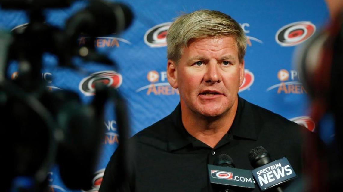 Head coach Bill Peters talks to reporters as the Carolina Hurricanes hold media day at PNC Arena on Sept. 5, 2017.