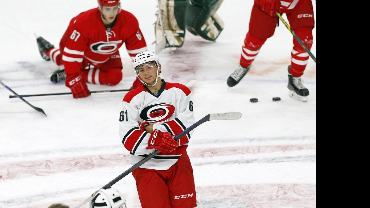 
Sergey Tolchinsky (61) flashes a smile near the end of the session as the Carolina Hurricanes hold a training camp for NHL prospects at PNC Arena in Raleigh on July 7, 2015.
