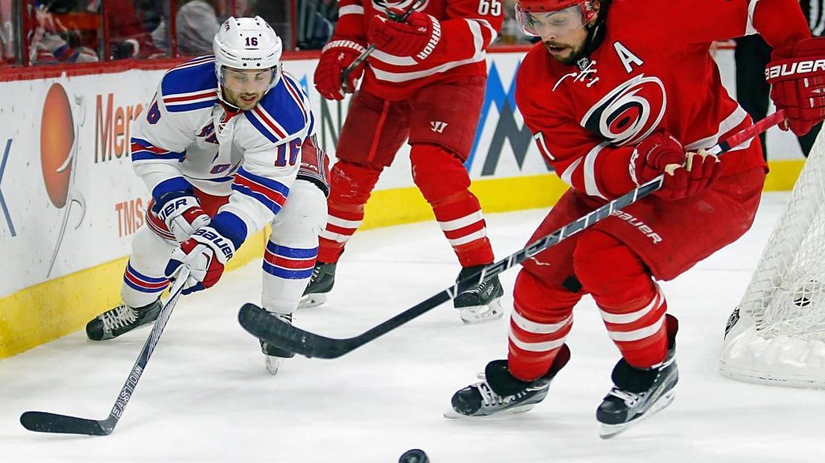 The Rangers Derick Brassard (16) battles the Canes Justin Faulk (27) during an NHL game played between the Carolina Hurricanes and the New York Rangers at PNC Arena in Raleigh, N.C. on Jan. 22, 2016. The Canes first home game of the 2016-2017 season will be against the Rangers on Oct. 28, 2016.