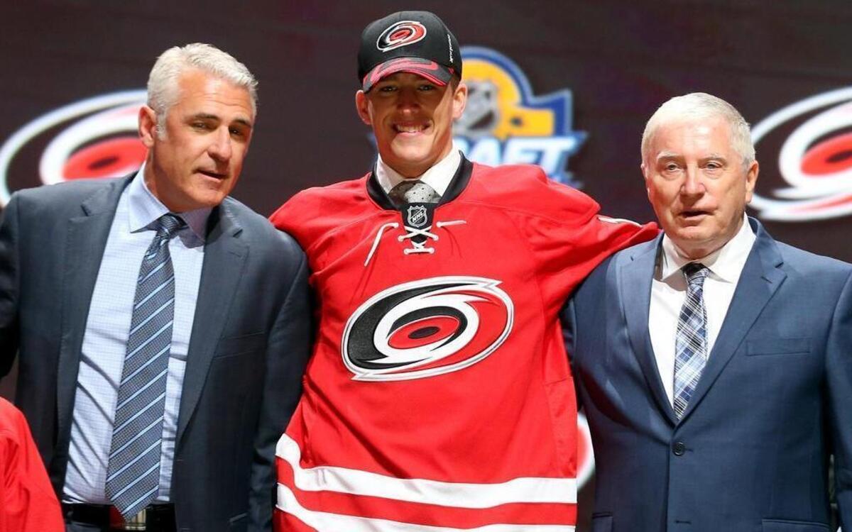 
Noah Hanifin poses after being selected fifth overall by the Carolina Hurricanes in the first round of the 2015 NHL Draft.
