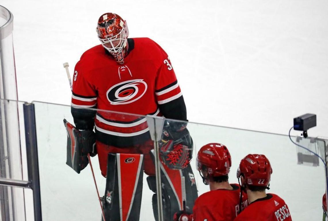 The Canes' Scott Darling (33) skates off the ice at the end of an NHL game played between the Carolina Hurricanes and the Detroit Red Wings at PNC Arena on Feb. 2, 2018. The Wings beat the Canes 4-1.