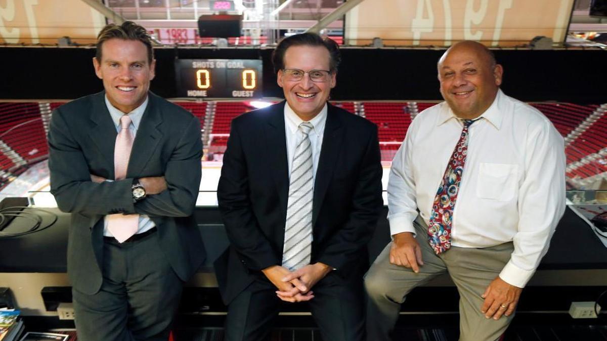 The Carolina Hurricanes broadcast team, Tripp Tracy, left, John Forslund, center, and Chuck Kaiton have been together since 1998.