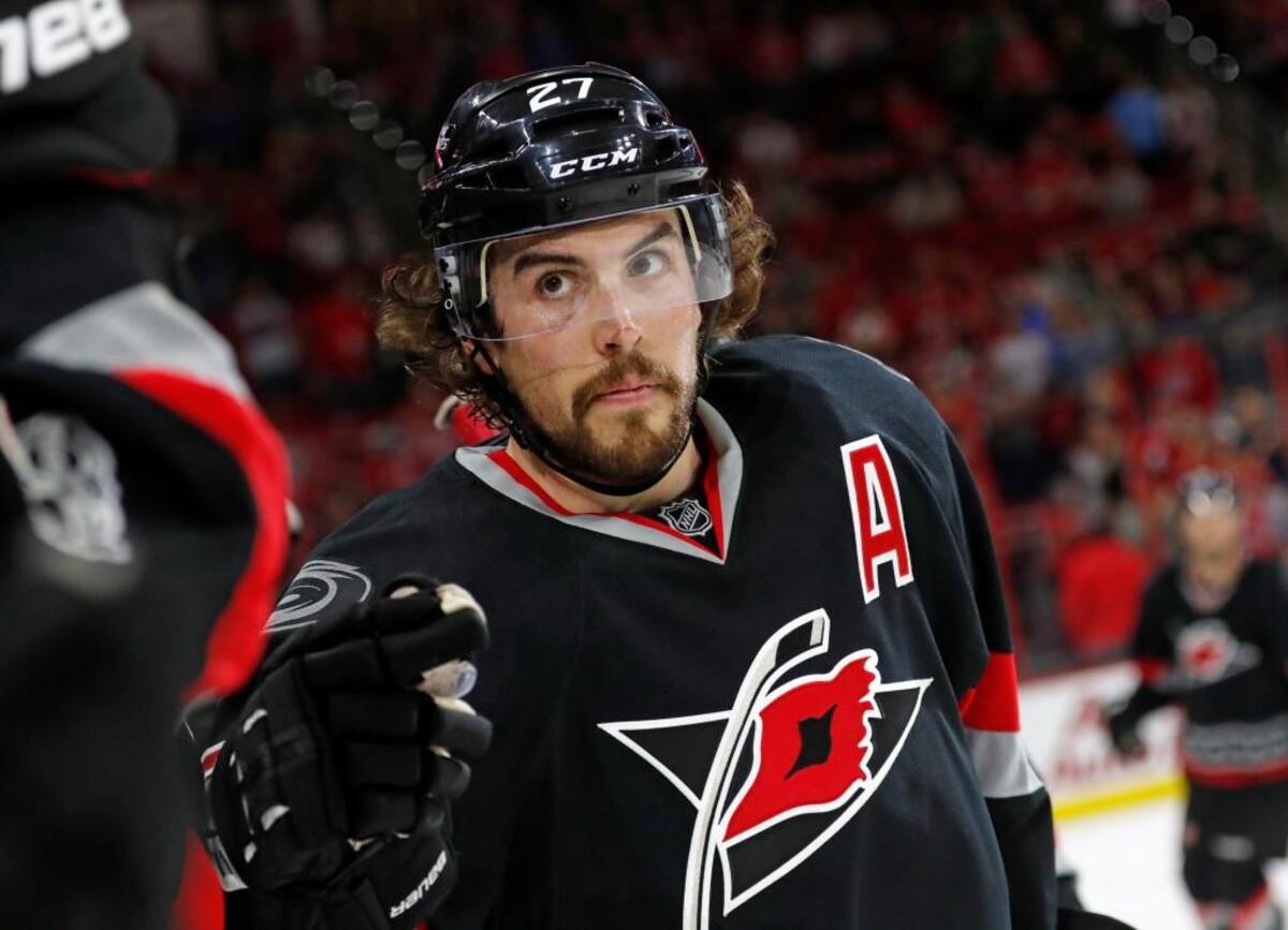 The Canes' Justin Faulk (27) celebrates his goal against the Detroit Red Wings at PNC Arena on March 27, 2017.