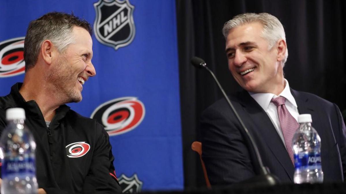 Thomas Dundon, left, with Canes’ general manager Ron Francis as Dundon was introduced as the buyer and new majority owner of the Carolina Hurricanes at a press conference at PNC Arena on Jan. 12, 2018.