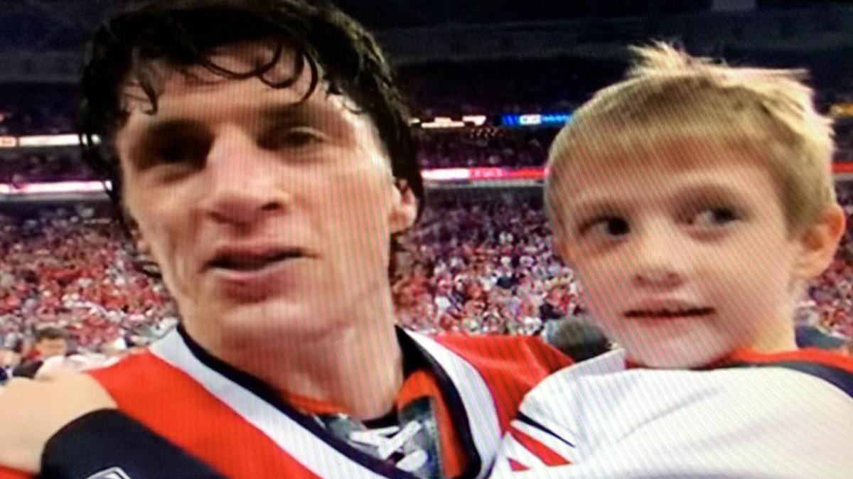 Frame grab from Carolina Hurricanes produced video showing captain of the 2006 Stanley Cup championship team Rod Brind'Amour, left, and his son Skyler Brind'Amour on the ice after the team won the Cup in June 2006.