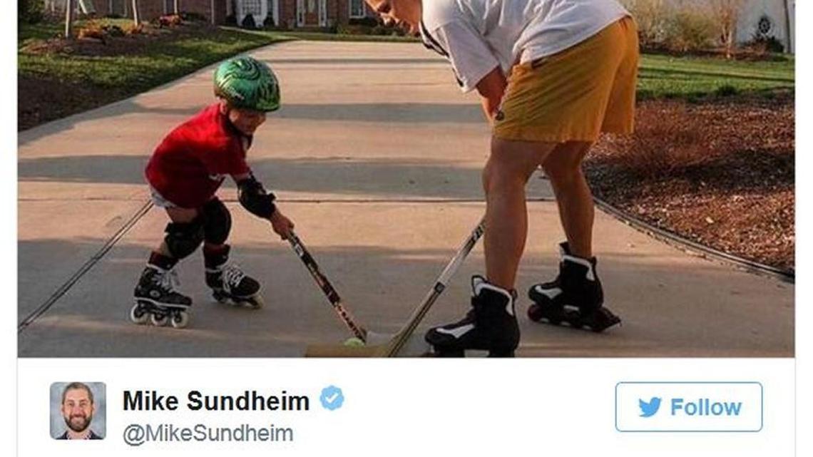 A young Kasperi Kapanen facing off with his dad, Carolina Hurricanes player Sami Kapanen, in their Raleigh driveway 17 years ago.