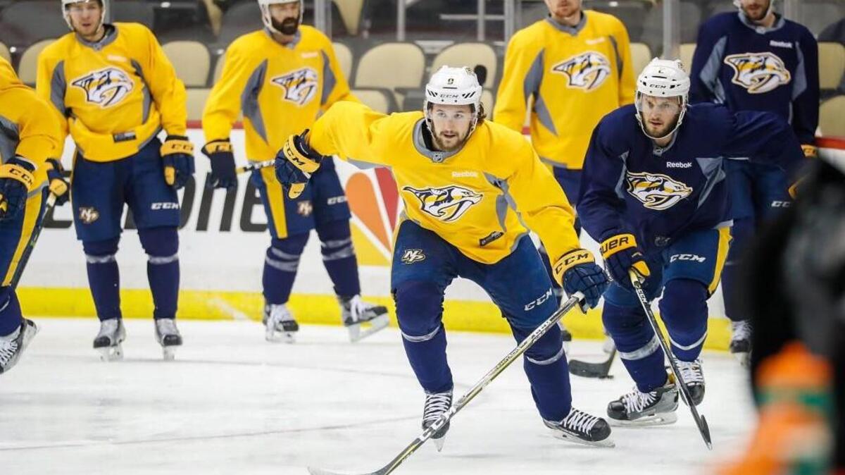 Filip Forsberg, left, and Anthony Bitetto, right, of the Nashville Predators, work out in the morning skate prior to Game 1 Stanley Cup Finals against the Penguins.