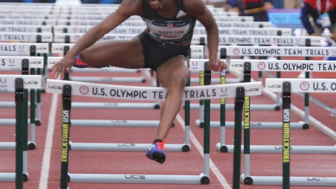 Clayton native Keni Harrison pushes for the finish line in the women’s 100-meter hurdle final at the U.S. Olympic Team Trials earlier this month in Eugene, Oregon. She finished sixth.