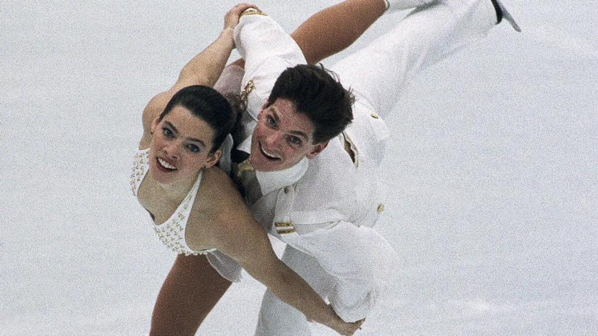 U.S. figure skaters Paul Wylie, of Denver, and Nancy Kerrigan, of Stoneham, Mass., perform during the figure skating exhibition at the XVI Winter Olympic Games, Saturday, Feb. 22, 1992, in Albertville, France. Wylie won the men?s silver medal and Kerrigan the bronze. (AP Photo/Lionel Cironneau)