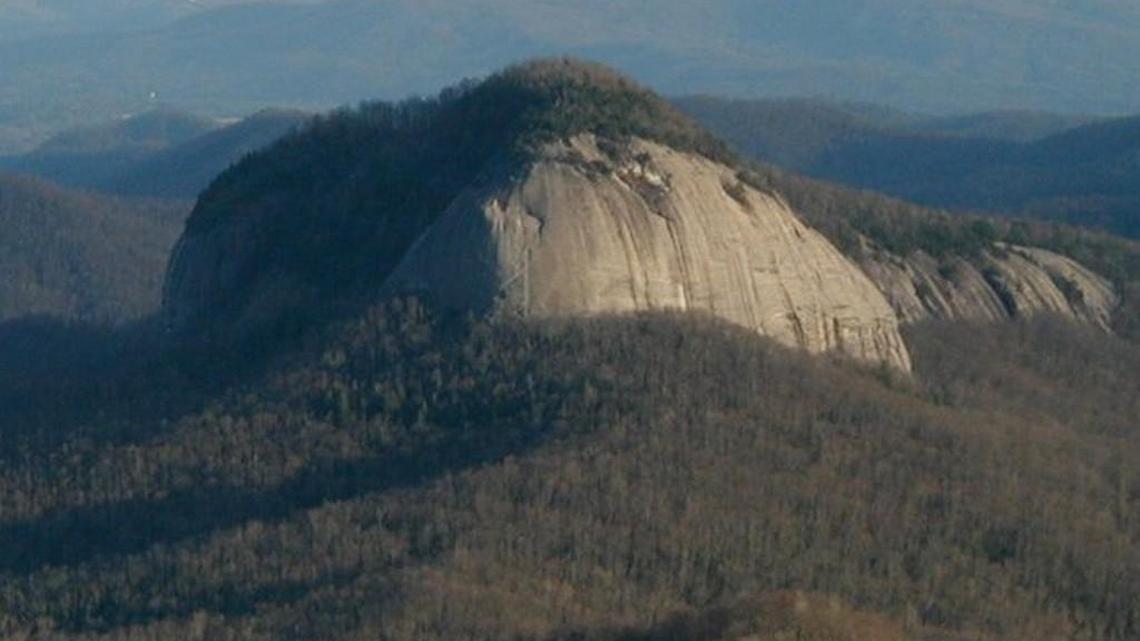 The climber fell about 50 feet at Looking Glass Rock, officials said.