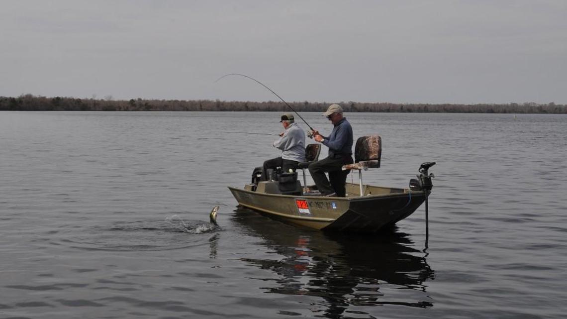 A sportsman battles a largemouth bass at Sutton Lake in Wilmington in this file photo.