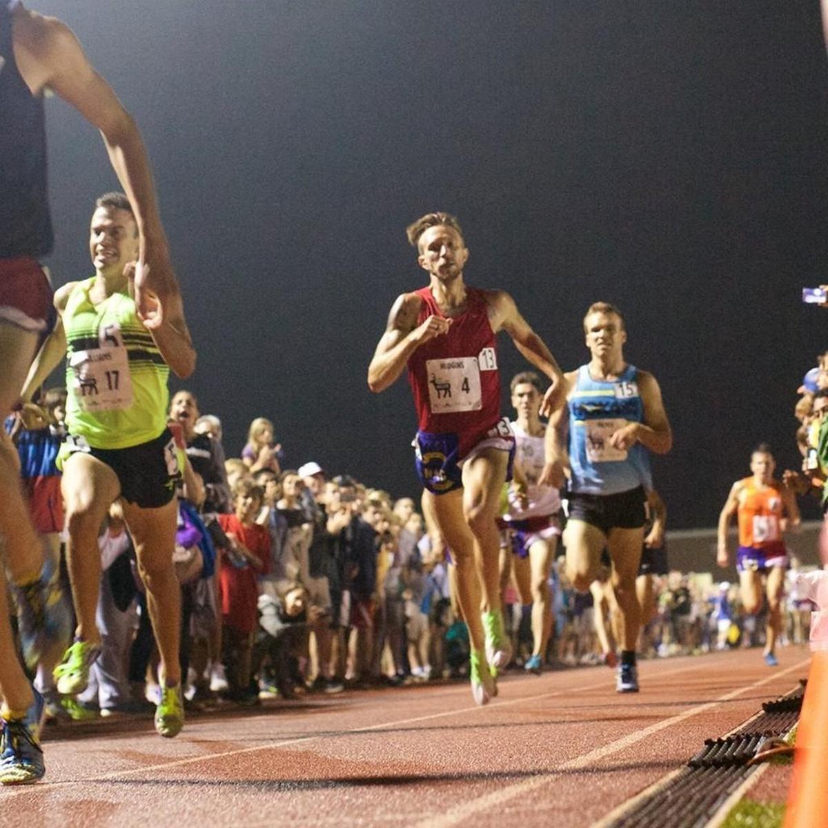 Barely touching the ground, Brandon Hudgins races toward the finish of the Sir Walter Miler in 2015
