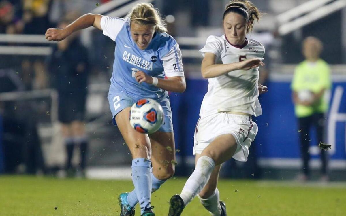 North Carolina's Emily Bruder (2) shoots the ball past Florida State's Megan Campbell (6) during Florida State's 2-1 victory over UNC in the semifinals of the ACC Women's Soccer Championship at WakeMed Soccer Park in Cary Friday, Nov. 6, 2015.
