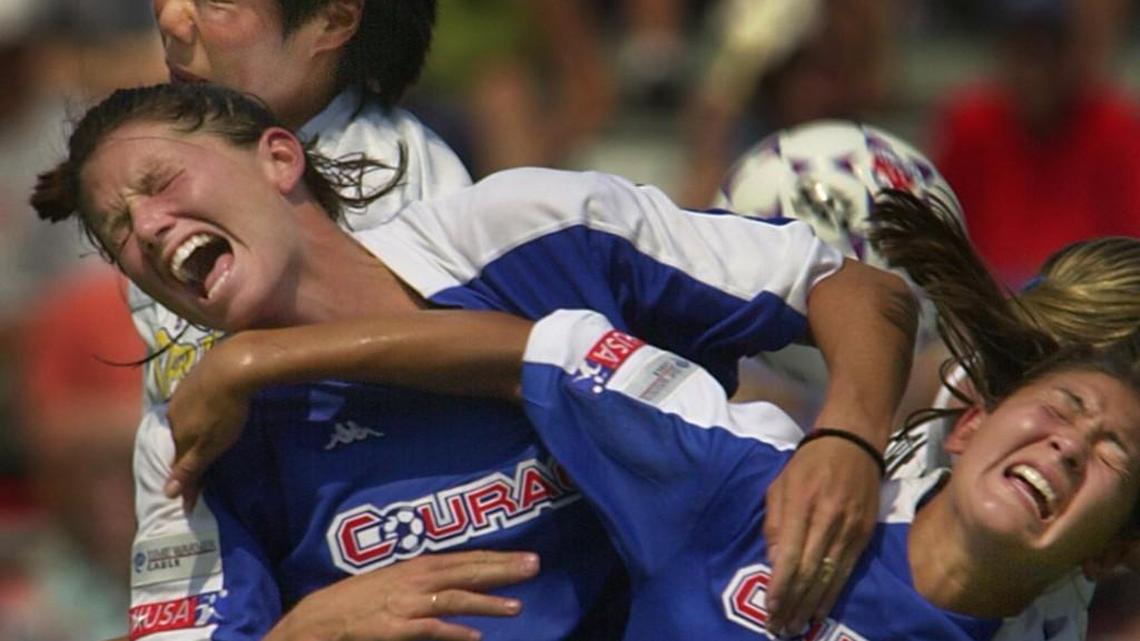 Tiffany Roberts Sahaydak, right, pictured in 2001, played for the Carolina Courage as a defensive midfielder. Roberts Sahaydak, now a coach at the University of South Florida, remembers being devastated when the women’s soccer team was shut down in 2003 and is excited to learn professional women’s soccer is returning to North Carolina.