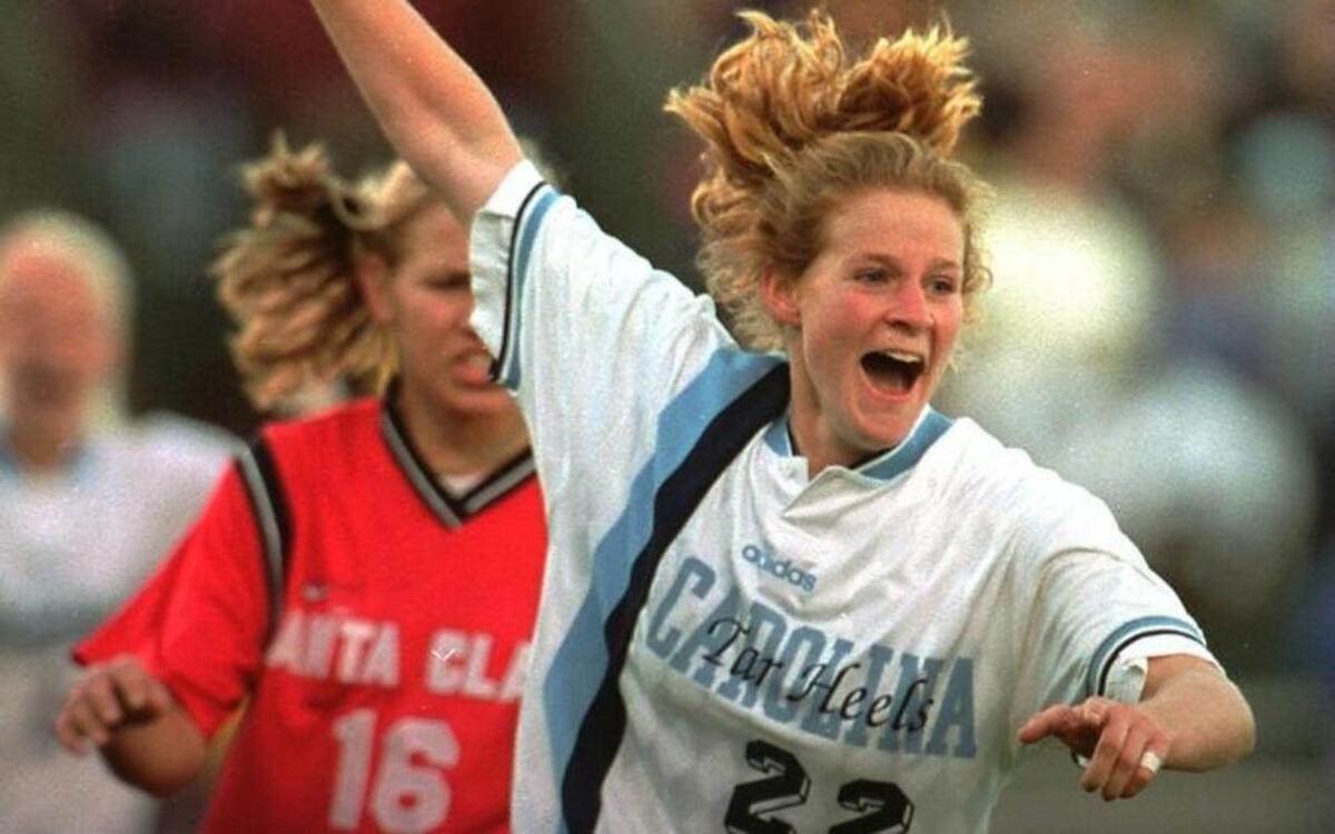 
Cindy Parlow starred at North Carolina before playing for the U.S. women’s World Cup and Olympic teams. She says Sarah Carlton’s problems with concussions in some ways mirror her own.
