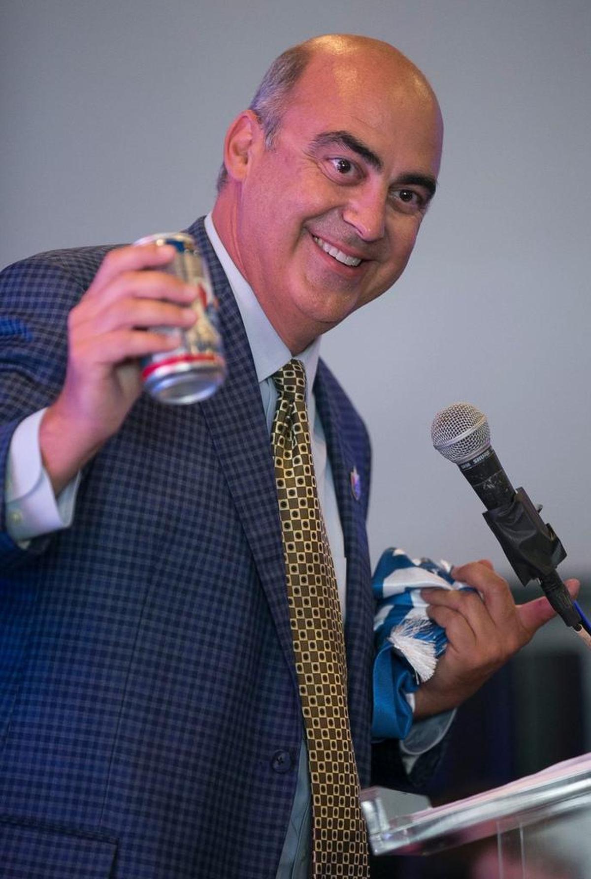 The North Carolina FC president Steve Malik speaks to soccer fans during a rally at City Market to promote Raleigh as a MLS expansion city on Wednesday.