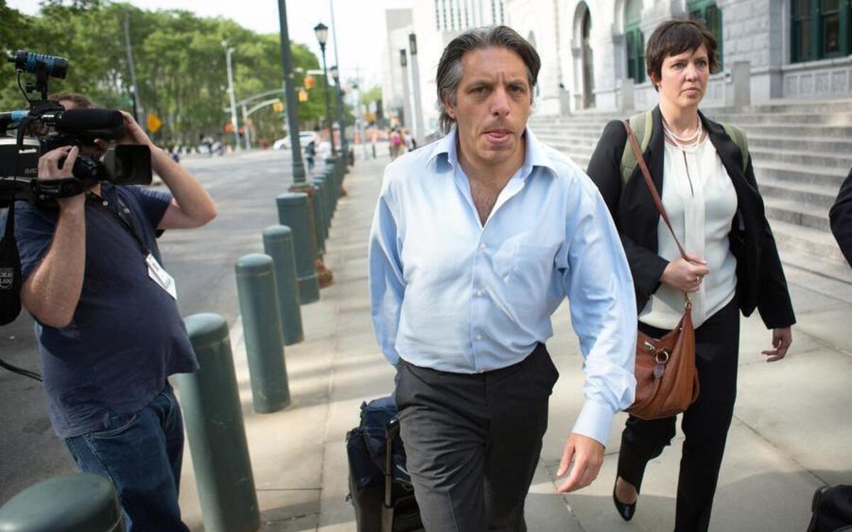 
Aaron Davidson leaves following his arraignment Federal Court in Brooklyn, NY May 29, 2015. Aaron Davidson entered a not-guilty plea through his lawyer in federal court in Brooklyn, becoming the first defendant to be arraigned in a U.S. court since the case was announced earlier this week. 
