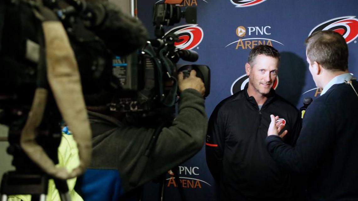 Thomas Dundon talks with reporters after he was introduced as the buyer and new majority owner of the Carolina Hurricanes on Jan. 12.