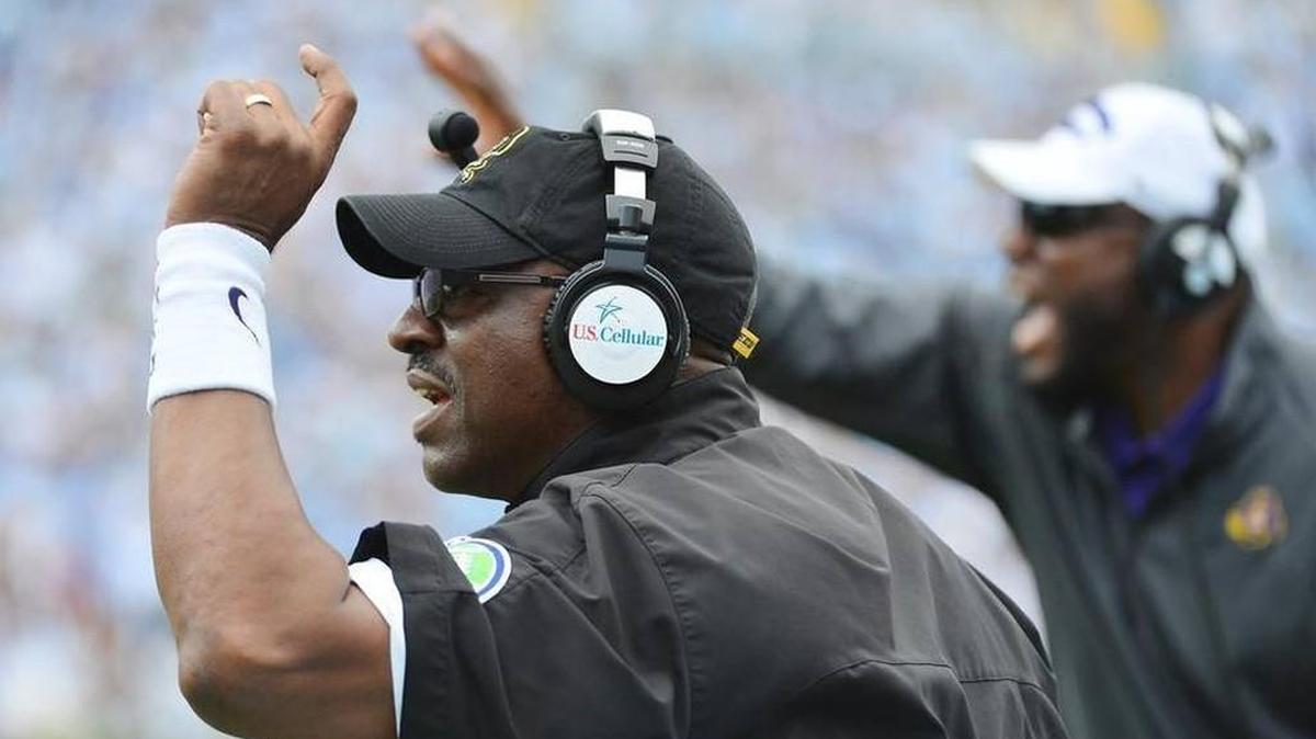 ECU head coach Ruffin McNeill yells at the offense as Pirates beat UNC 55-31 at Kenan Stadium in September, 2013.