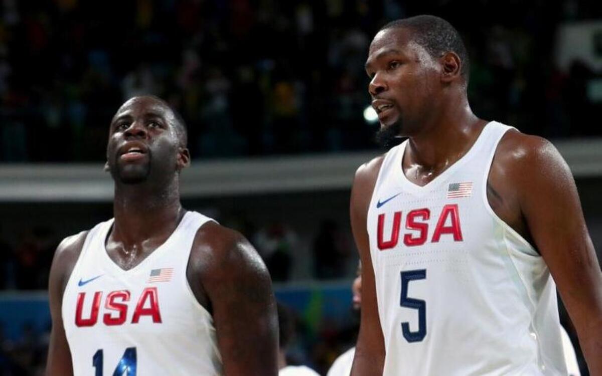 Kevin Durant #5 and Draymond Green #14 of United States walk off the court after defeating Serbia in the Men's Preliminary Round Group A match on Day 7 of the Rio 2016 Olympic Games at Carioca Arena 1 on August 12, 2016 in Rio de Janeiro, Brazil.