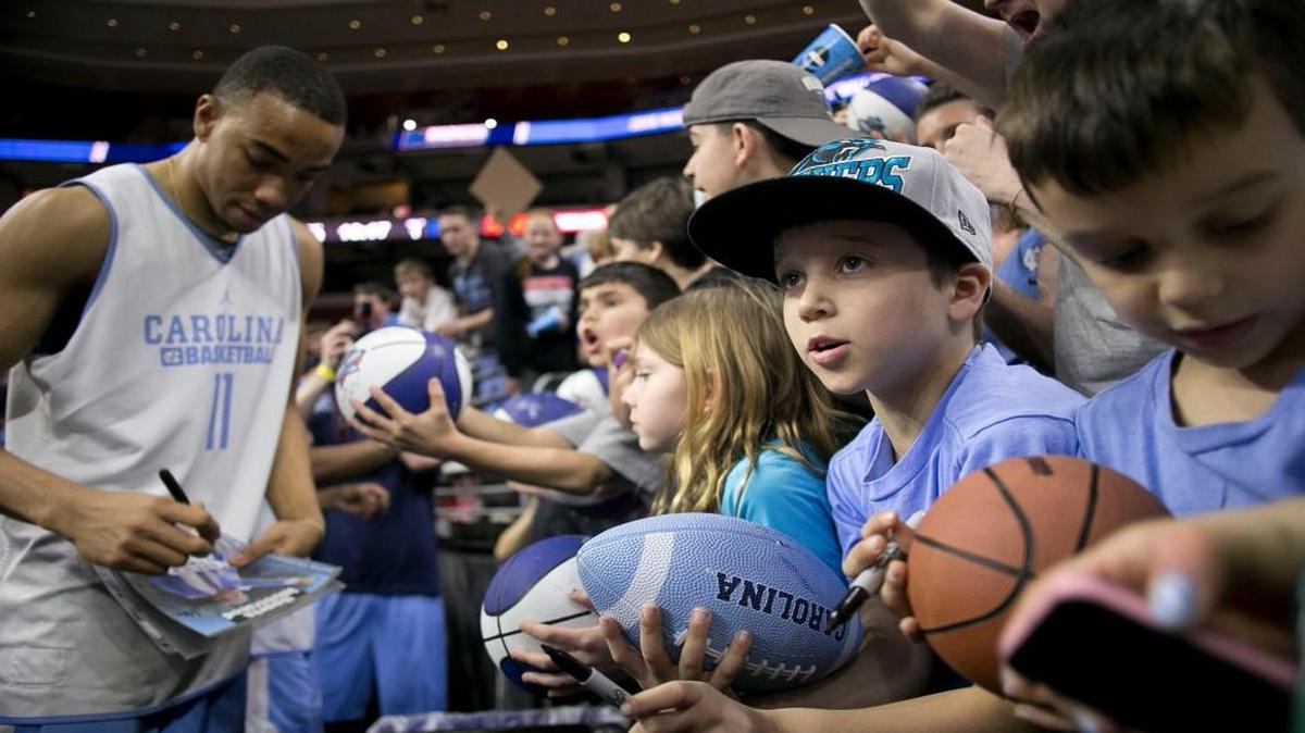 Eight-year-old Declan O’Brien of Plymouth Meeting, Pa. waits for an autograph from Brice Johnson following the Tar Heels’ practice on Thursday, March 24, 2016 at the Wells Fargo in Philadelphia, Pa.