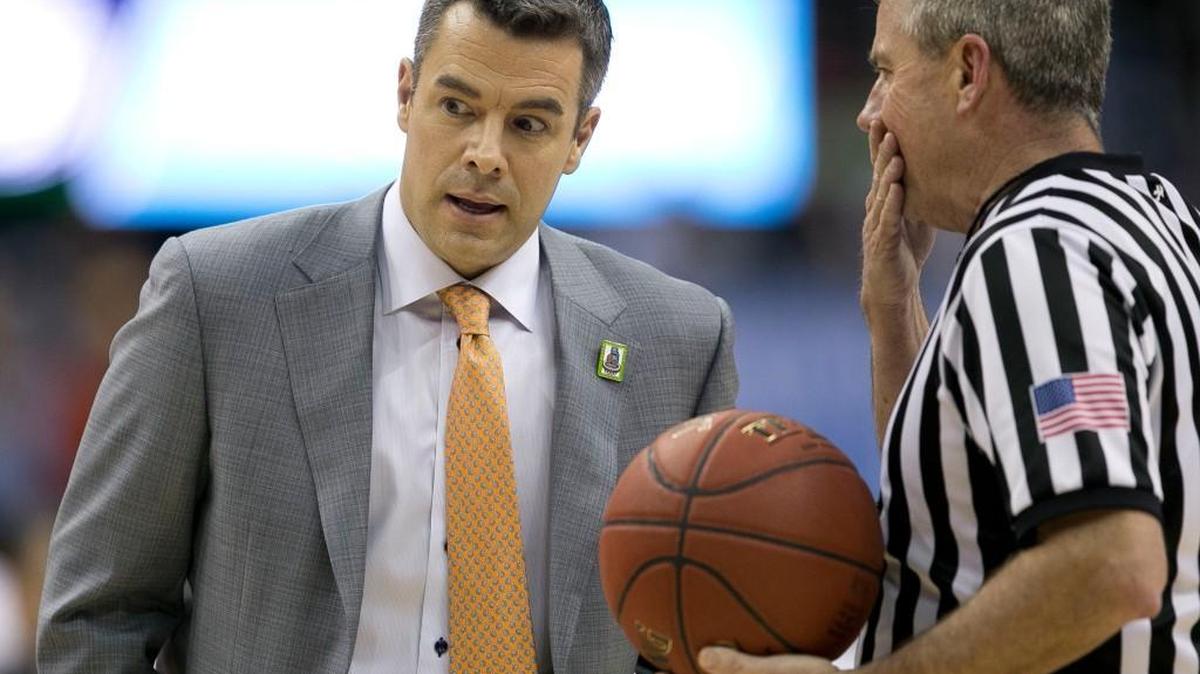 Virginia coach Tony Bennett listens to official Bryan Kersey during the first half against North Carolina on March 12 in the ACC tournament Championship at the Verizon Center in Washington, D.C.