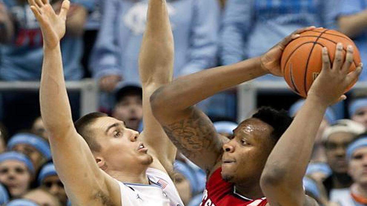 
North Carolina’s Jackson Simmons played two minutes against BeeJay Anya and N.C. State on Feb. 24. 
