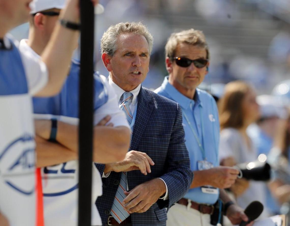 UNC' ahletic director Bubba Cunningham comes out to see what's going on as players tussle in the closing minutes of the fourth quarter of an NCAA college football game played between the California Golden Bears and the UNC Tar Heels at Kenan Stadium in Chapel Hill, NC, on Sept. 2, 2017. Cal beat UNC, 35-30.