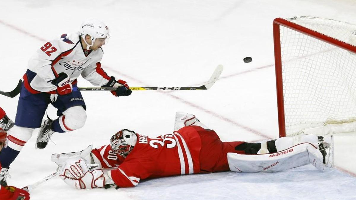 The Washington Capitals' Evgeny Kuznetsov (92) has his shot stopped by Canes goalie Cam Ward during the third period at PNC Arena.