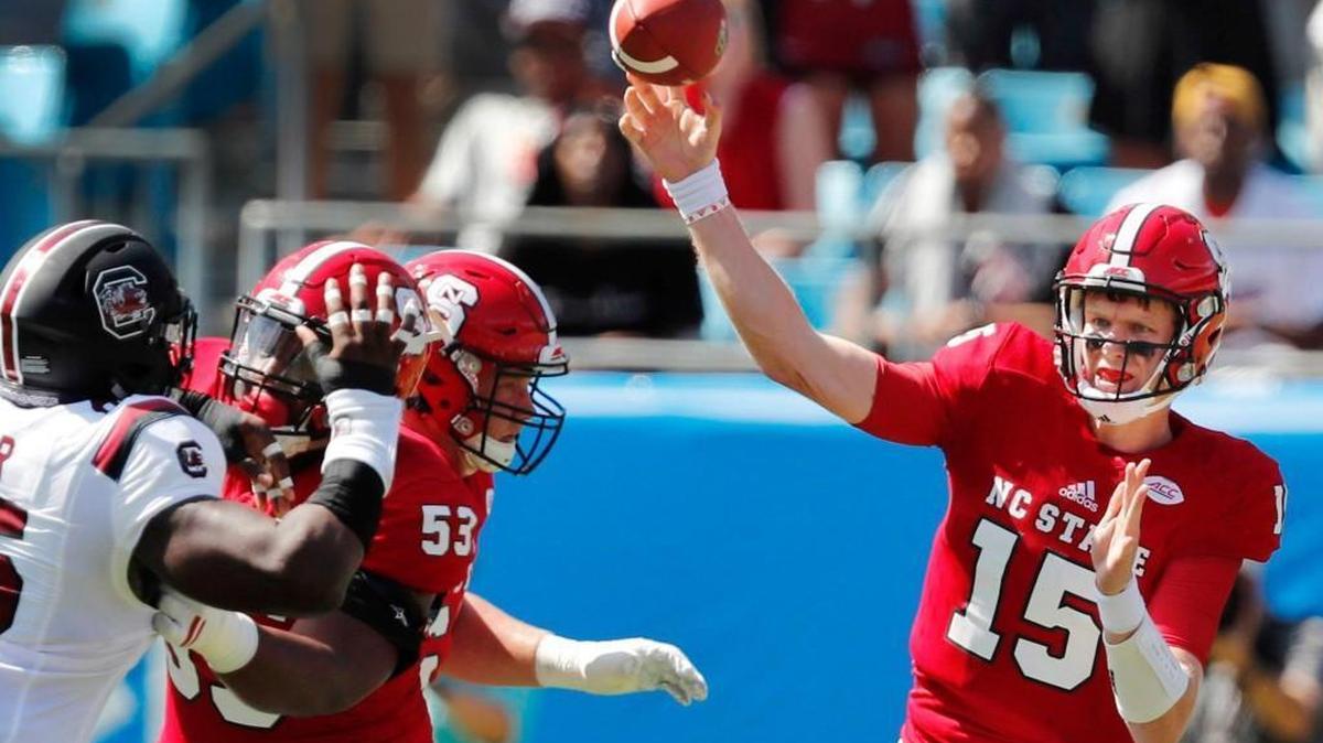 N.C. State quarterback Ryan Finley (15) passes during game against South Carolina on Sept. 2, 2017.